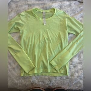Neon yellow swiftly w small snag on back
